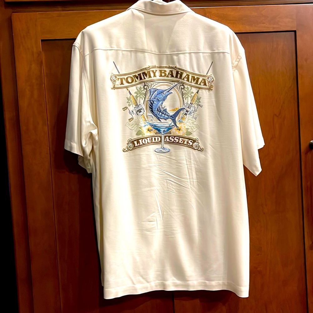 100% silk Tommy Bahama embroidered shirt . Very very cool! Great condition.